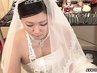 Nightfall darkness Emi Koizumi fucked on bridal apparel uncensored.
