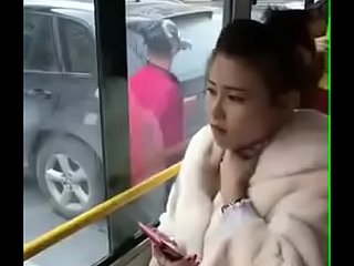 Chinese girl kissed. Upon bus .